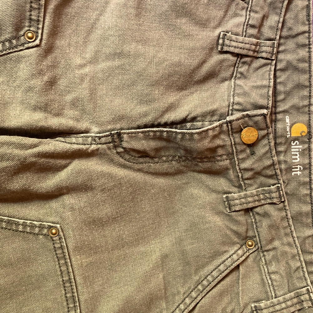 Woman’s size 4 slim Carhartt olive green pants